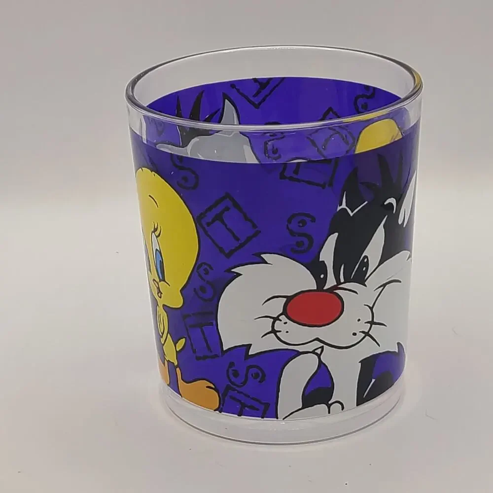 vintage 1994 Warner Brothers clear Plastic. mug featuring the Looney Tunes